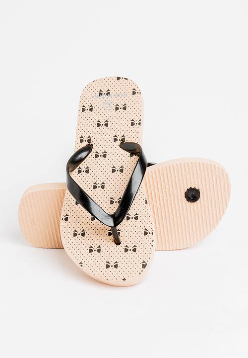 Pop Candy - Printed flip flops - beige & black 