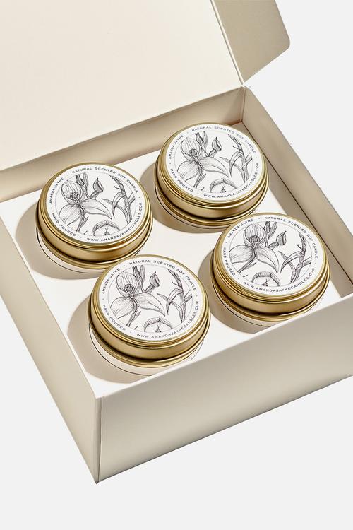 Four gold tin candle gift set
