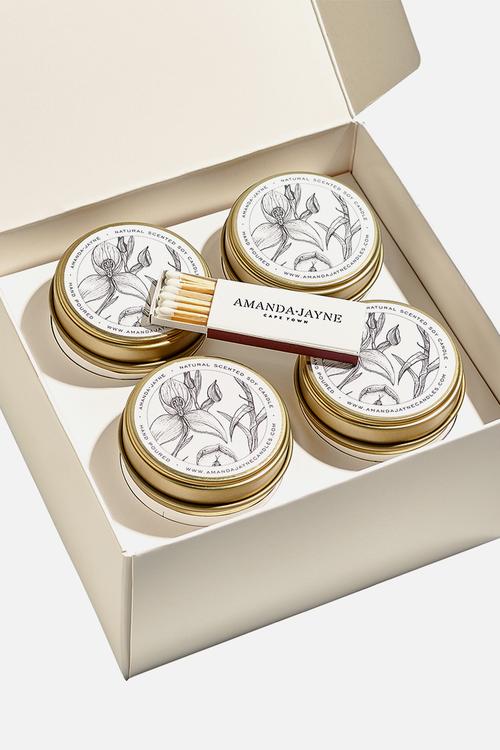 Four gold tin candle gift set
