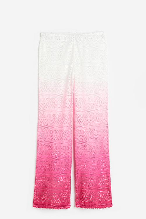 Flared hole patterned jersey trousers - bright pink