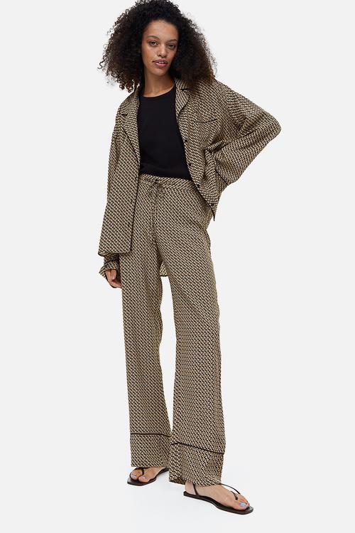 Patterned trousers -  beige patterned