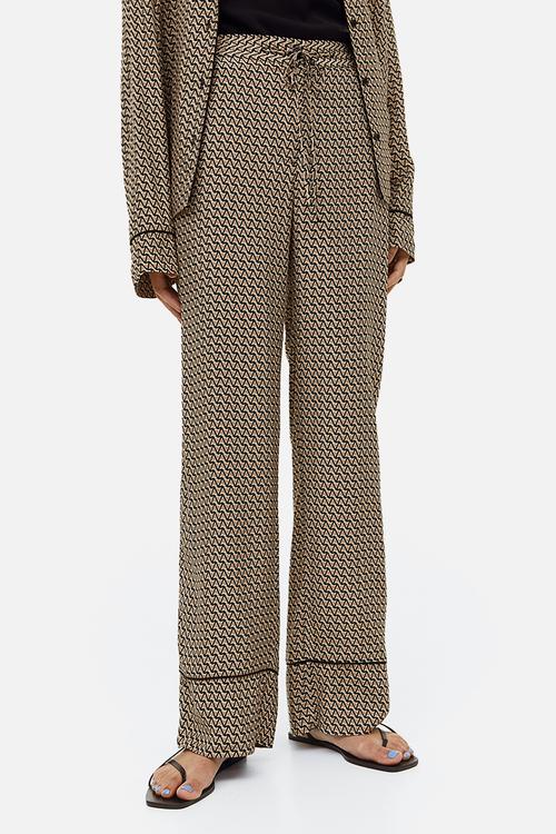 Patterned trousers -  beige patterned