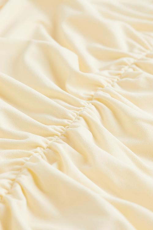 Gathered top with a turtle neck - cream