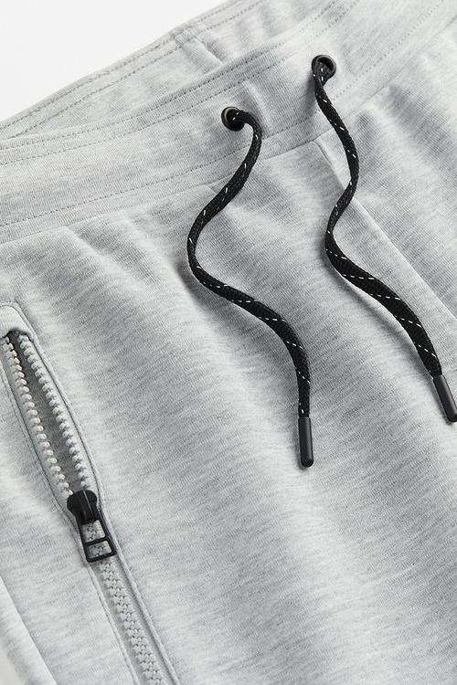Drymove™ tapered tech joggers with zipped pockets - grey