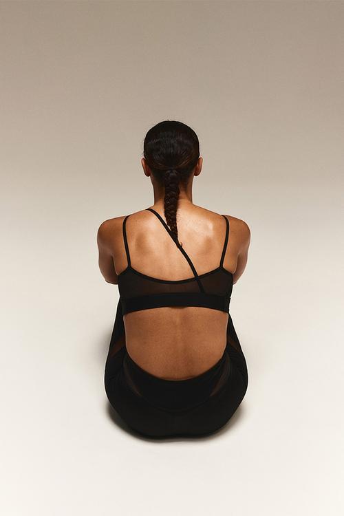 Drymove™ light support mesh-detail sports bra - black