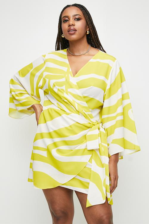 Plus exaggerated sleeve mini wrap dress - yellow graded zebra.