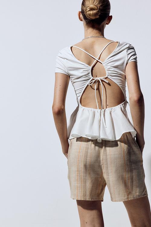 Open-back peplum top - cream
