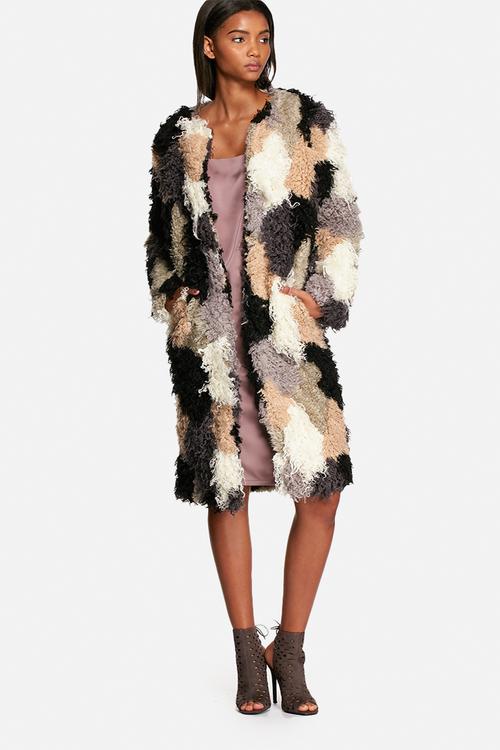 Patchwork shearling coat