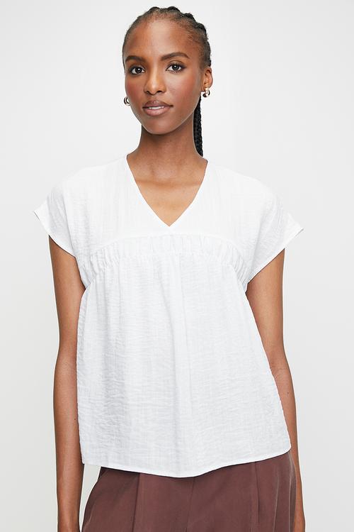 Notch neck ruffle top with embroidery detail - white/navy