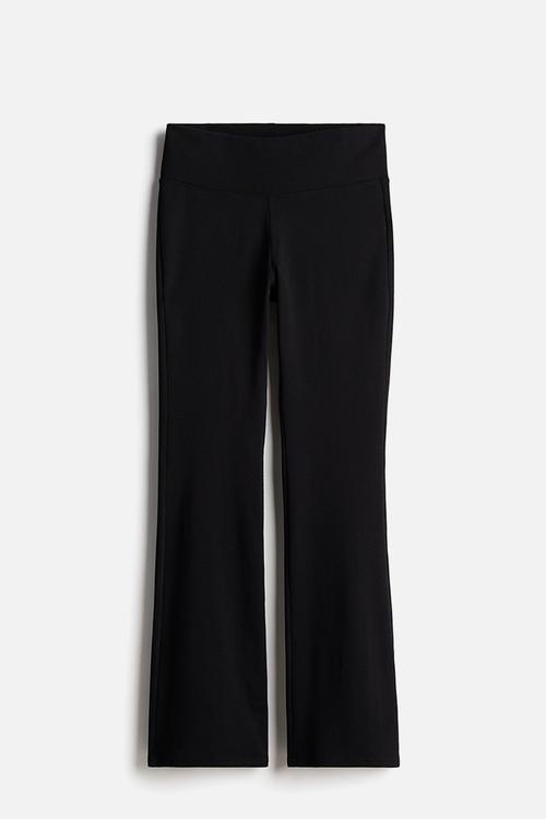 Flared leggings - black/ribbed
