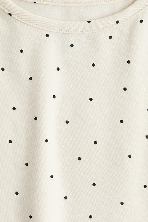 Overlock-detail cotton top - cream spotted