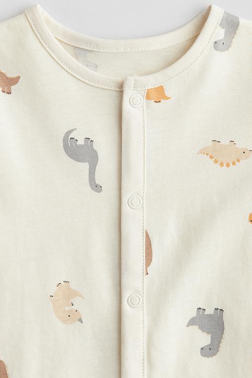 Patterned sleepsuit - cream dinosaurs