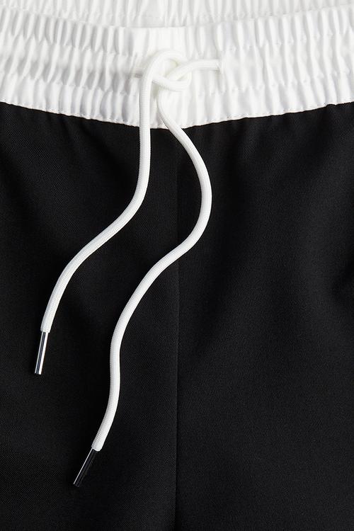 Crease-leg drawstring trousers - black & white