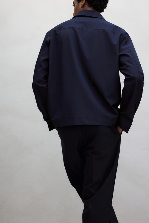 Relaxed fit tapered trousers - navy blue