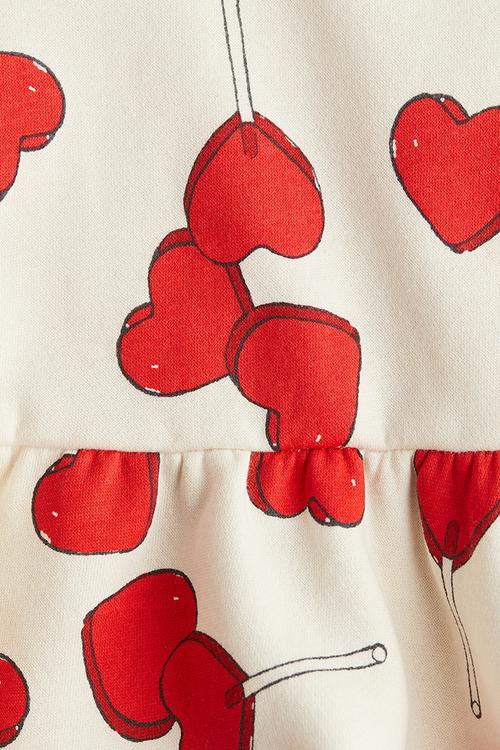Peplum sweatshirt - cream hearts