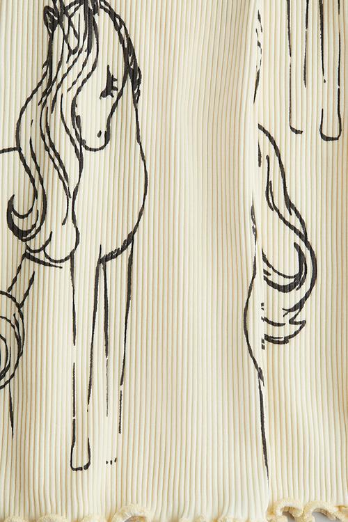 Flared leggings - light yellow unicorns