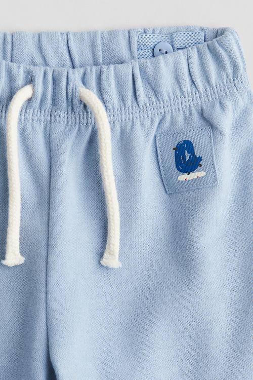 Cotton joggers - light dusty blue bird