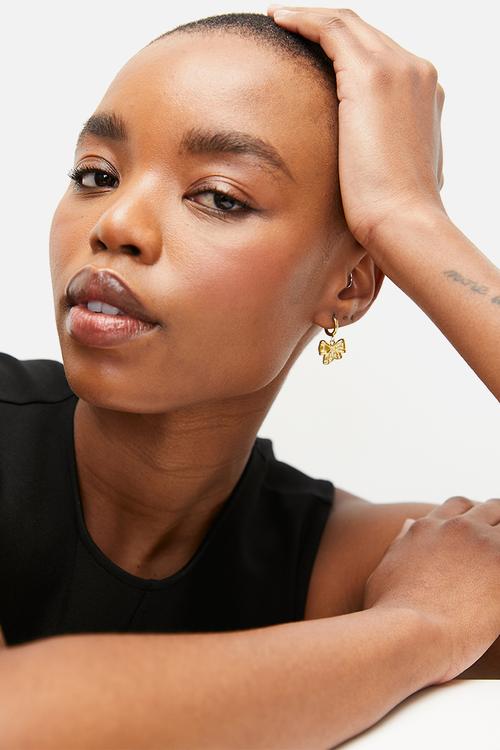 Hoop and bowtie drop earrings - gold