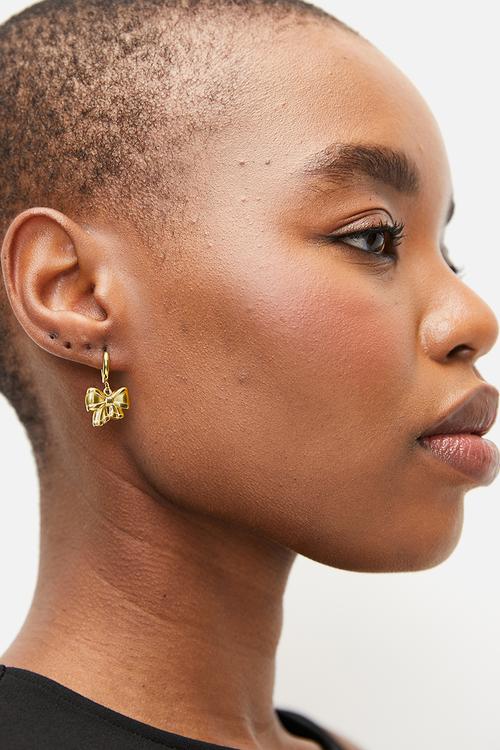 Hoop and bowtie drop earrings - gold