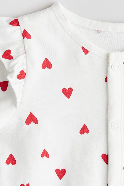 Patterned sleepsuit - white hearts 