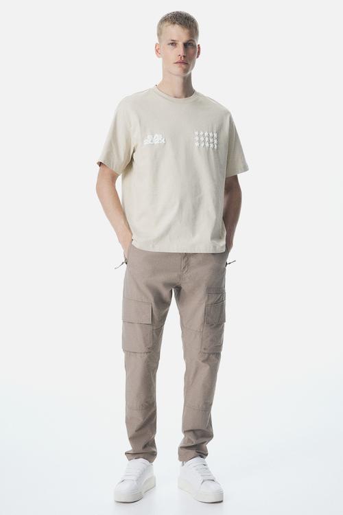 Loose fit printed t-shirt - beige stars