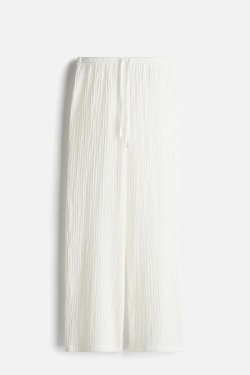 Crinkled drawstring trousers - cream
