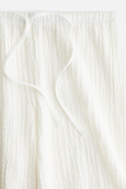 Crinkled drawstring trousers - cream