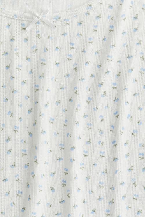 Overlock-detail pointelle top - cream/floral 