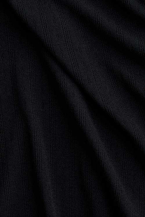 Overlock-detail pointelle top - black