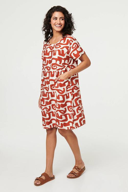 Oversized sack Dress with front pocket detail - Rust