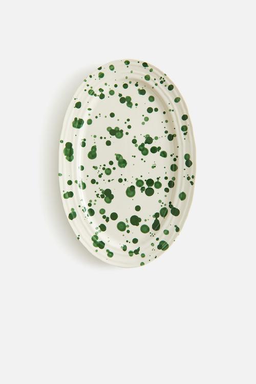Speckled-glaze stoneware serving plate - green spotted