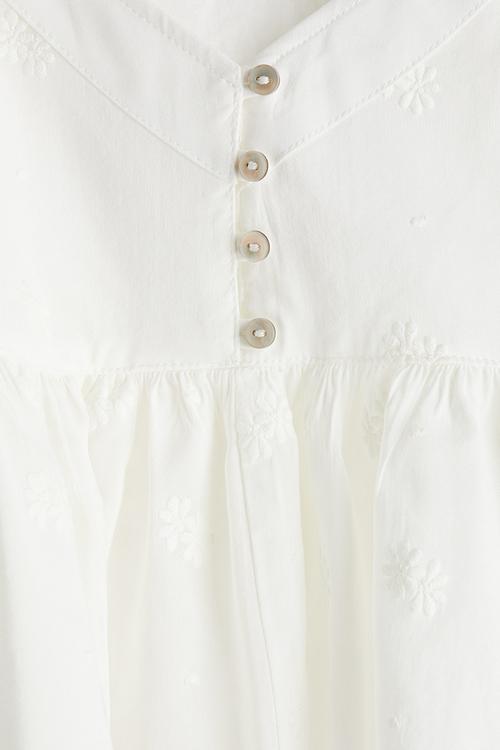 Peplum strappy top - cream flowers