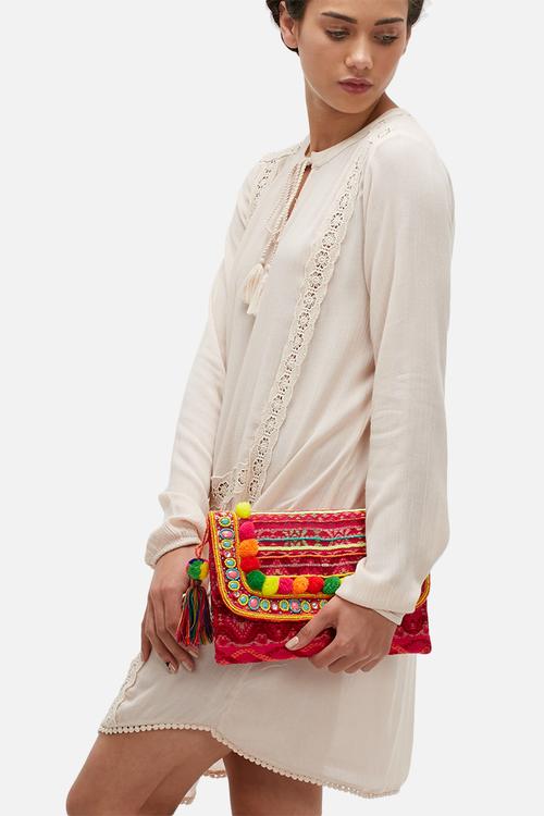 Embroidered pom pom clutch
