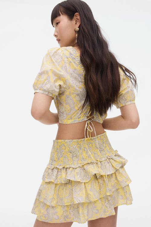 Tiered mini skirt - light yellow paisley patterned