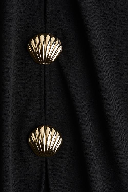Button-decorated top - black