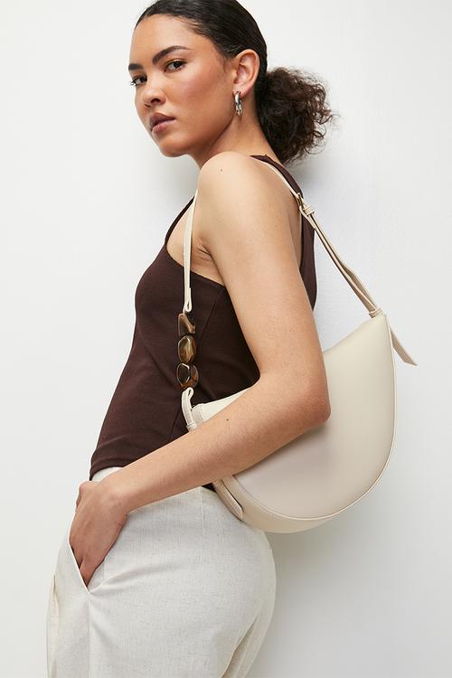 Crescent shaped shoulder bag with beaded strap detail - cream