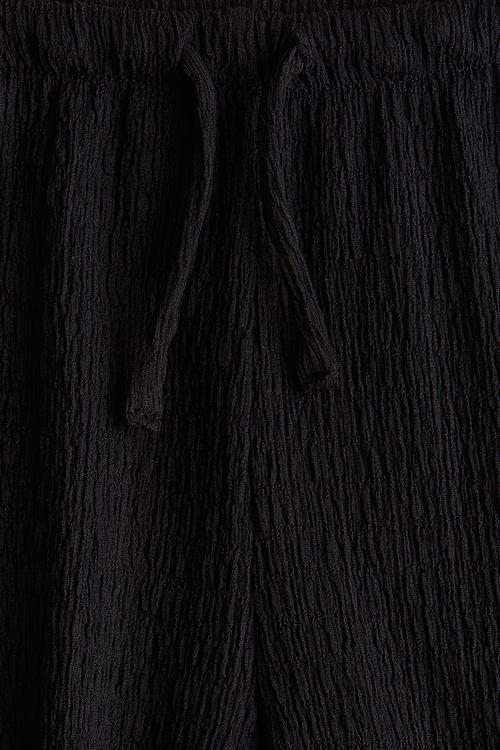 Textured jersey trousers - black