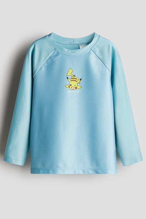 Upf 50 printed swim top - light blue pokémon 
