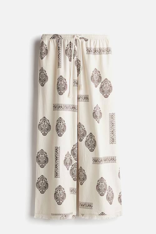 Linen-blend drawstring trousers -  light beige/paisley-patterned 