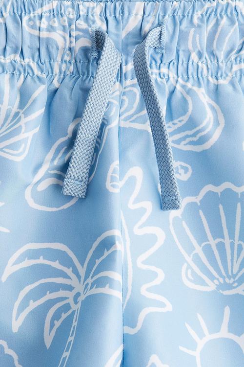 Printed swim shorts - blue/seashells