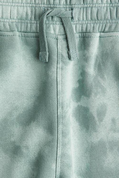 Printed sweatshirt shorts - green tie-dye
