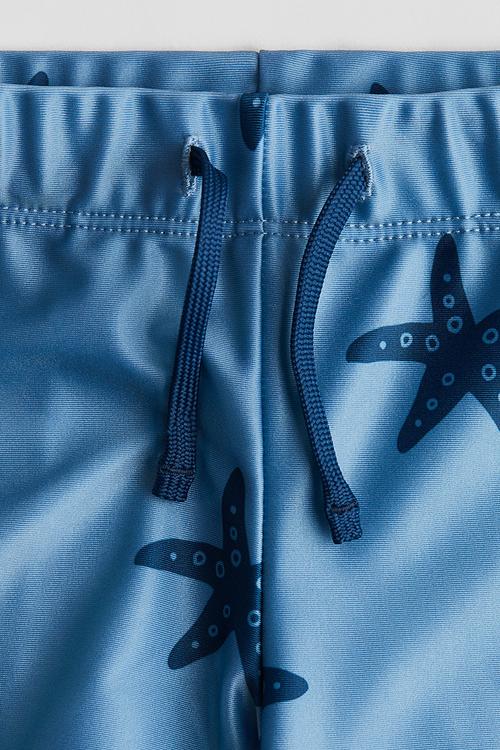 Printed swimming trunks - blue starfish