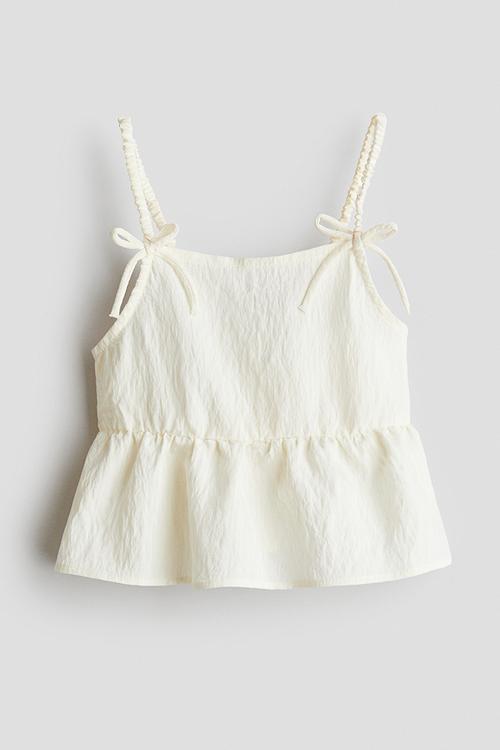 Bow-detail peplum top - cream