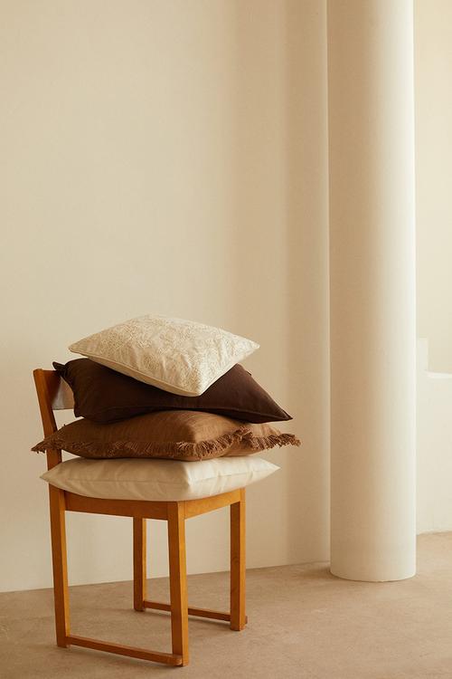 Embroidered cushion cover - light beige