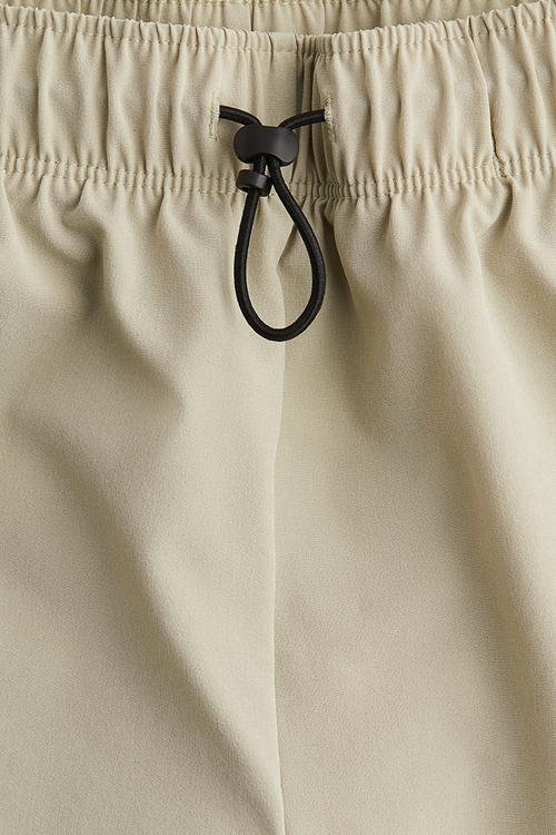 Lightweight sports shorts with drymove™ - light-beige