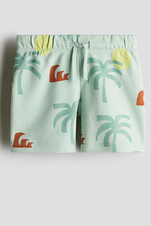 Printed sweatshorts - light turquoise/palm trees 