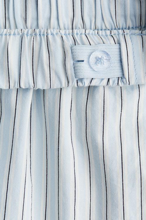 Frill-trimmed cotton shorts - blue