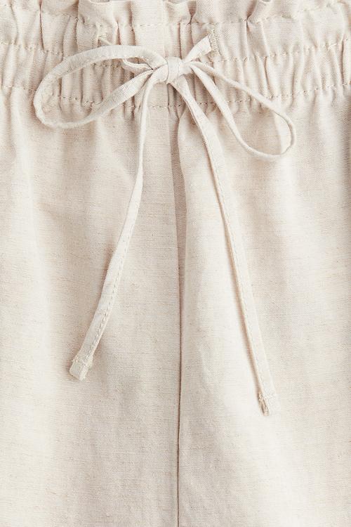 Cropped linen-blend trousers - light beige
