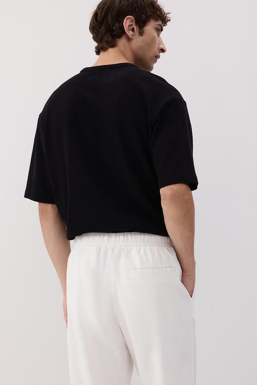 Relaxed fit linen-blend trousers - white