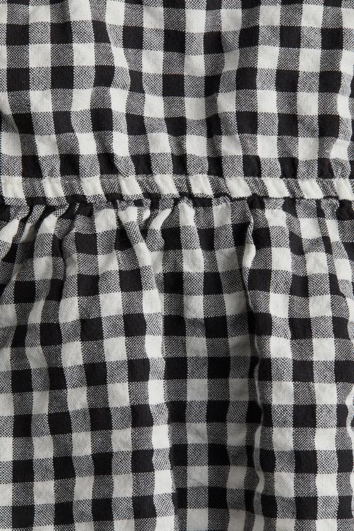 Bow-detail peplum top -black/checked